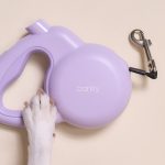 Retractable dog leash with an integrated 130db personal safety alarm